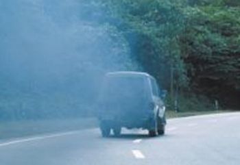cars emitting pollution