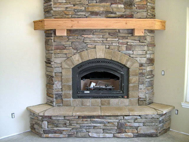 A fireplace built-in shelf made of wooden blocks