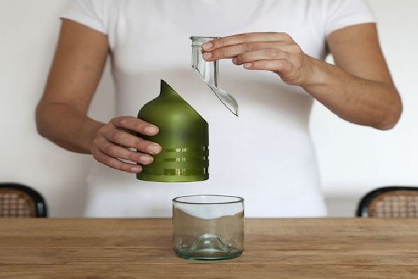 A Wine Bottle That Can Be Recycled Into Three Useful Objects