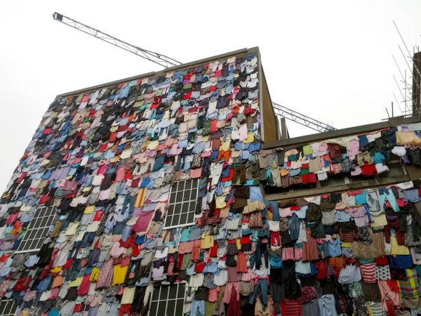 Building covered in old clothes