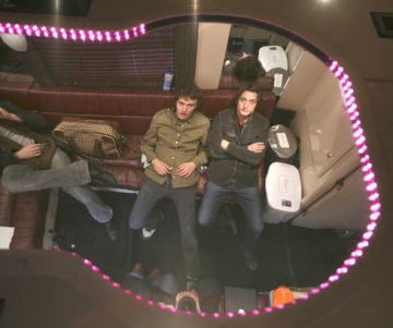 gomez members in their tour bus 9