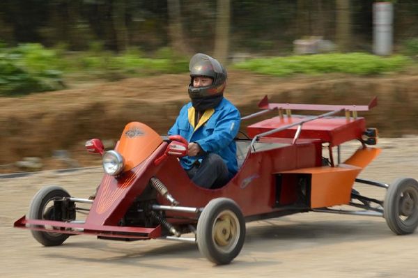 In focus: Man builds racing car from spare motorcycle parts