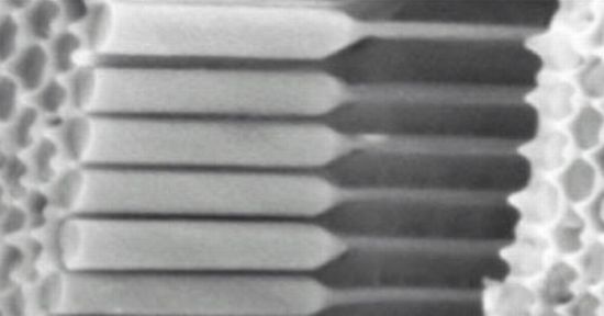 nanopillars to reduce cost of thin film solar cell