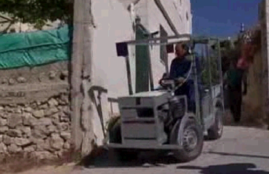 palestinian man with homemade electric car