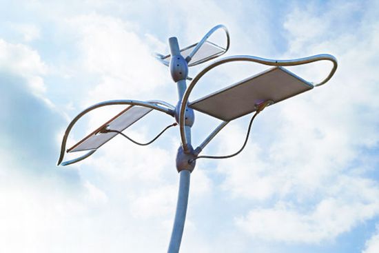 sun catching solarflora sculpture holds solar pane