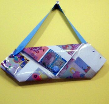 trendy purse from recycled pages