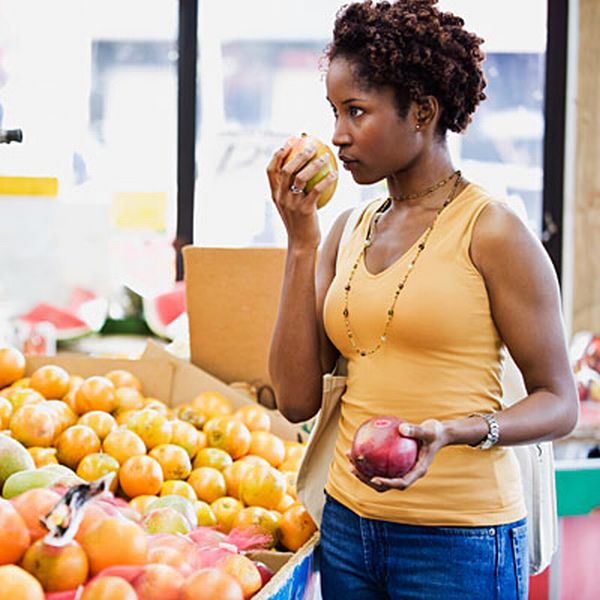 woman-smelling-fruit-400x400