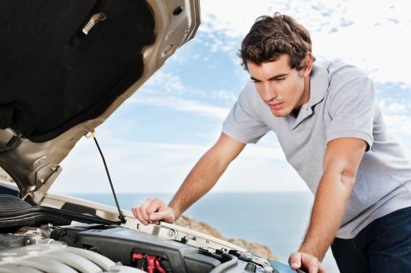 Man Looking Under Hood