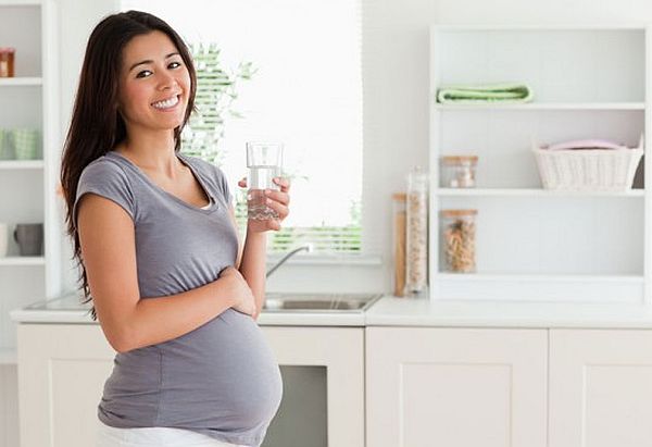 pregnant lady drinking water