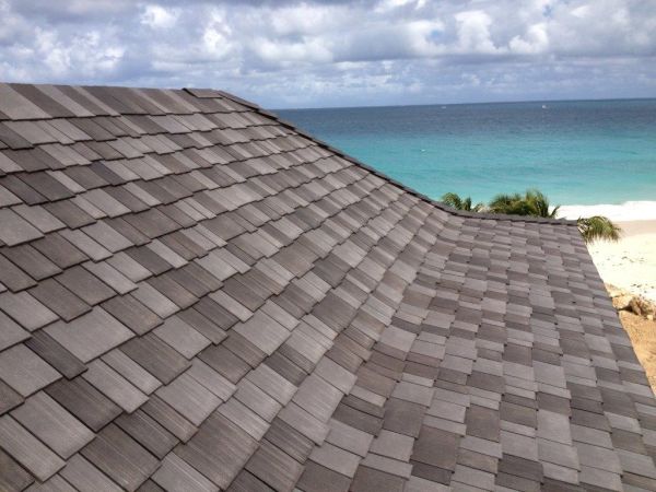 Roofs made using recycled shingles