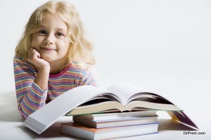 A little girl reading a book