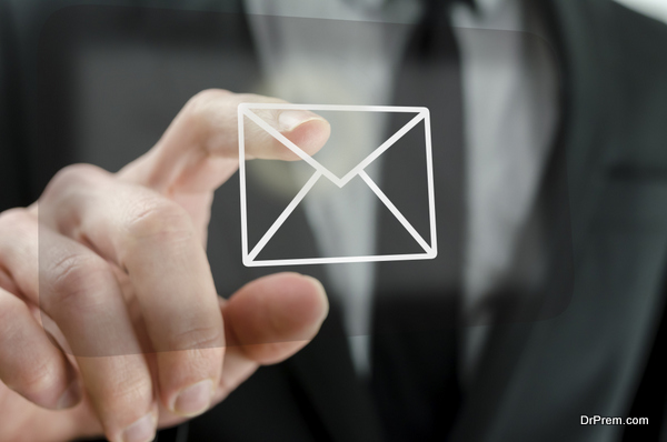 Businessman touching email icon