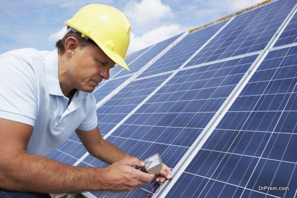 Man installing solar panels