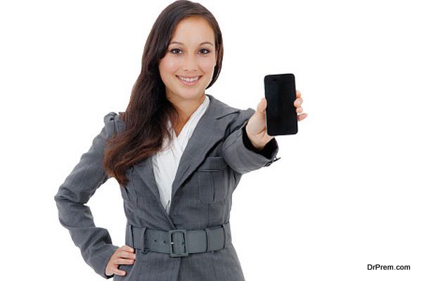 Business woman holding a cell phone