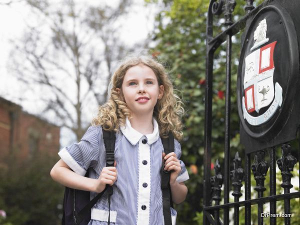 girl walking towards school