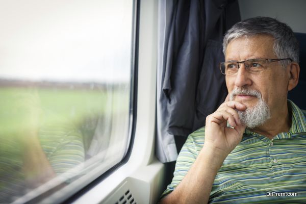  old-man-in-train-compartment