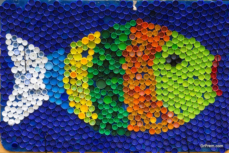 Fish mosaic deocoration made of cororful plastic bottle caps