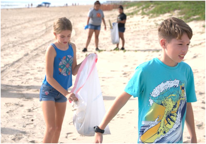 Cleaning a beach 