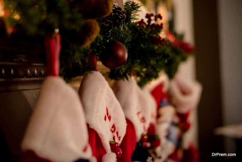 Christmas stockings are hanging by the chimney