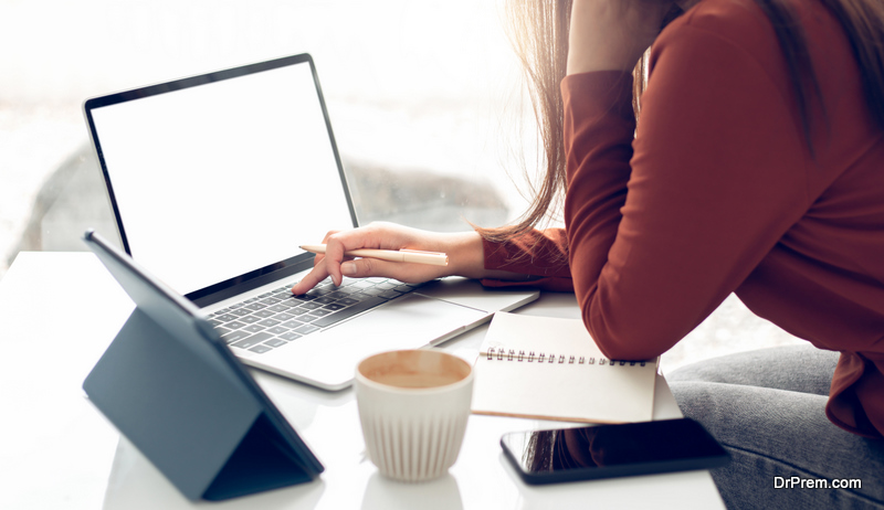 Focus on hand young asian woman using laptop 