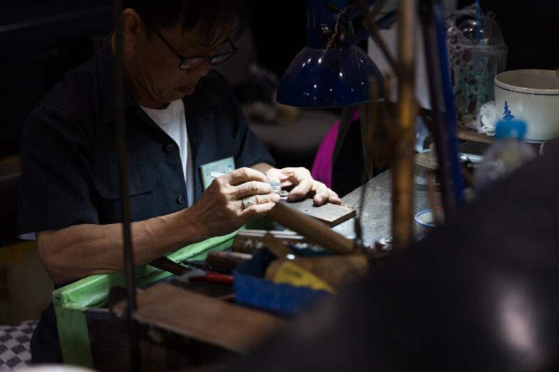 Jewler in workshop making rings